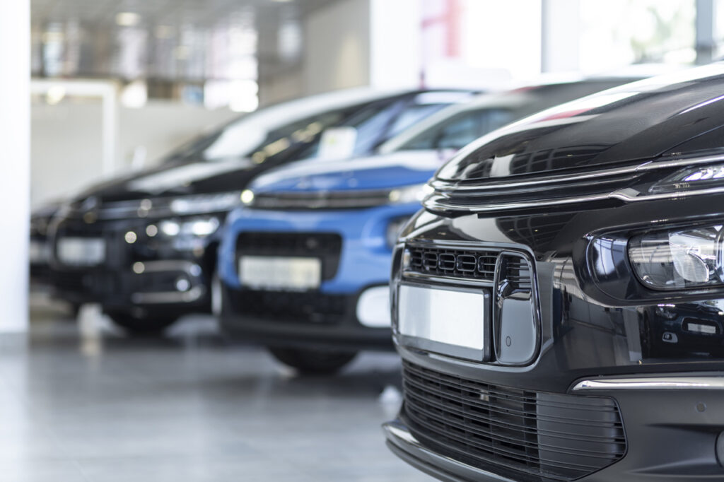 auto dealer insurance service cars lined up at dealer