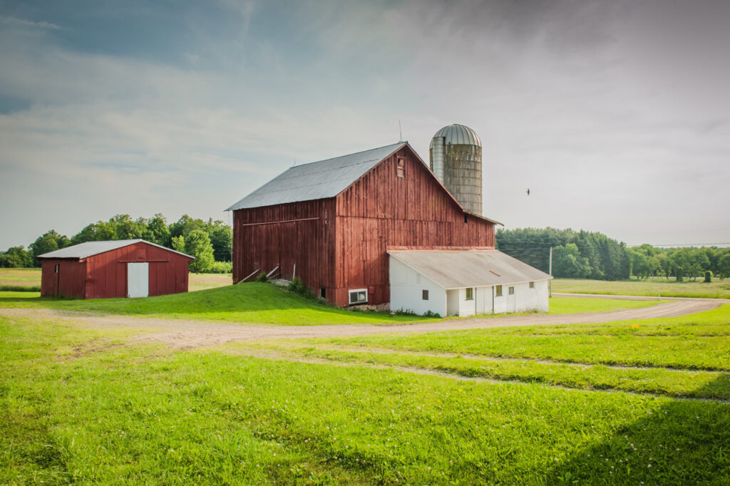 farm insurance service red barn in field
